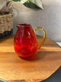 Amberina crackle glass pitcher glows with UV